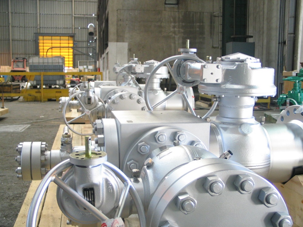 Industrial valves and actuators in a manufacturing workshop